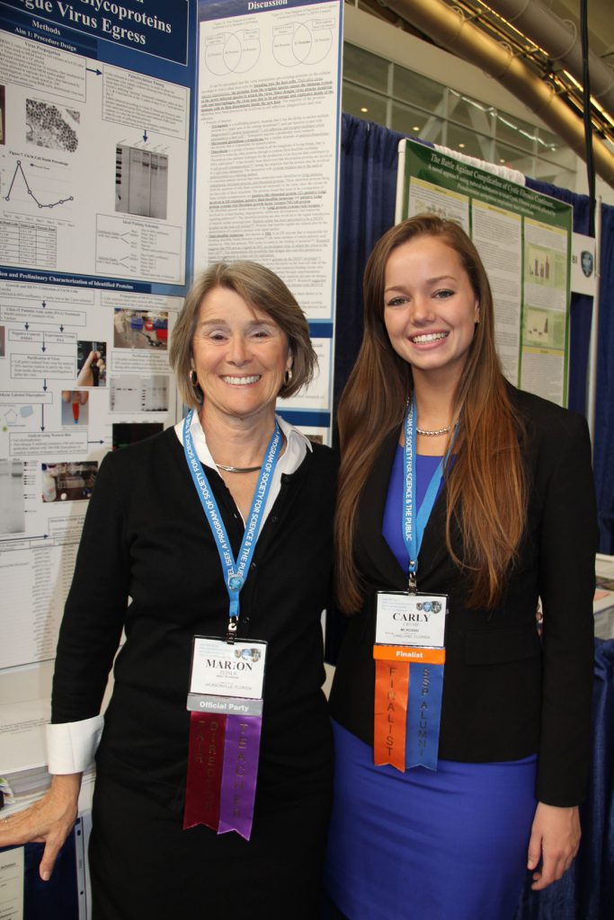 Carly Crump is at the Intel International Science and Engineering Fair with Marion Zeiner, Director of Scientific Research, Chemistry Instructor, Director of Northeast Florida Regional Science & Engineering Fair, Episcopal School of Jacksonville.