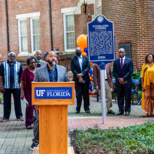 A photo of the University of Florida unveiling in 2021 a historical marker honoring the integration pioneers who led the charge to desegregate the institution.