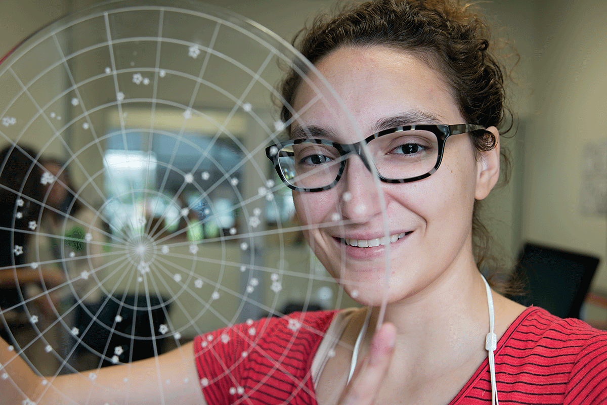 Art technology student Madeline Morales used the laser cutter at right to construct a constellation map.