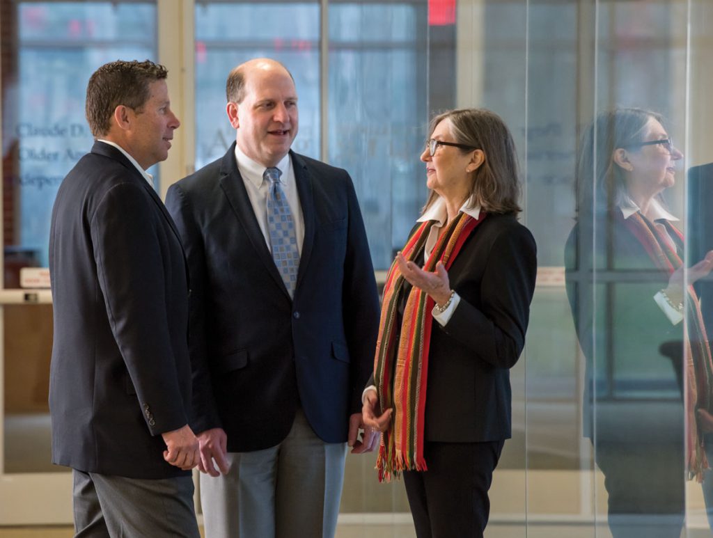 Nelson, Biomedical Informatics Director William Hogan and Community Engagement and Research Director Linda Cottler.