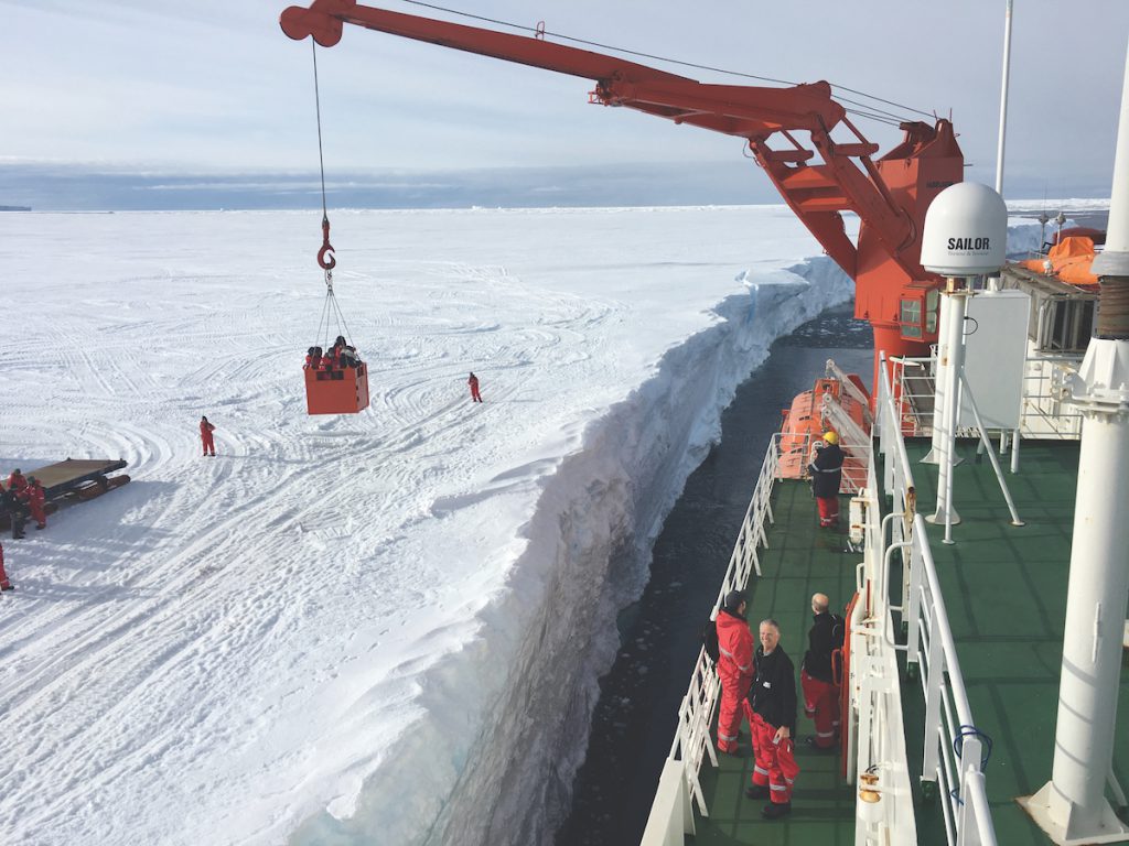 The arrival of a resupply ship is cause for celebration. There are no docks, so the ship just pulls up close to the ice shelf and holds its position with thrusters while transferring people and cargo back and forth. Paul says it wasn’t until she actually stood on the ice shelf and stared hundreds of feet down to the ocean that she fully appreciated how abruptly it ended. “It really is a shelf. Huge pieces can break off and become icebergs.”