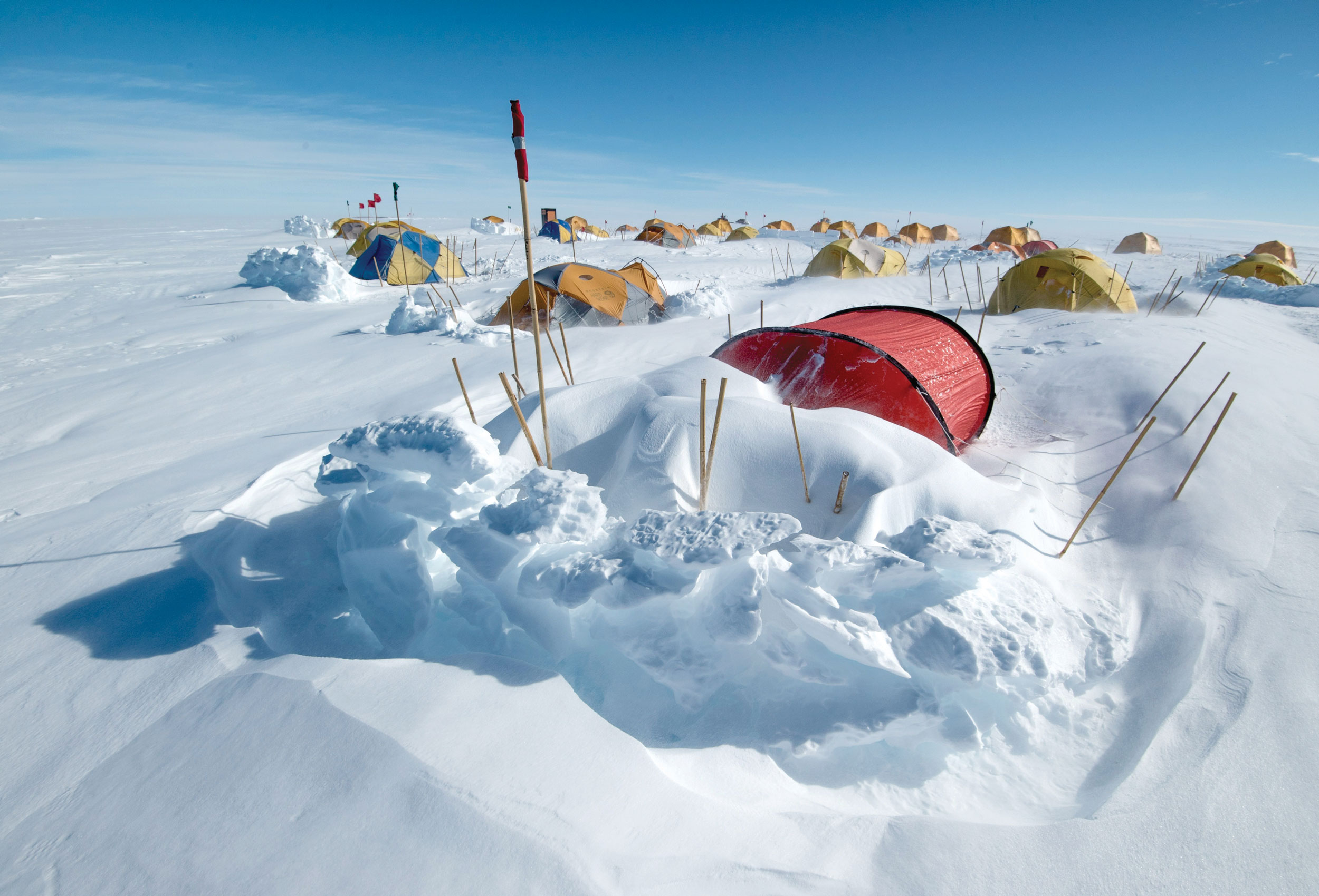 Tents semi-buried in snow in Antarctica