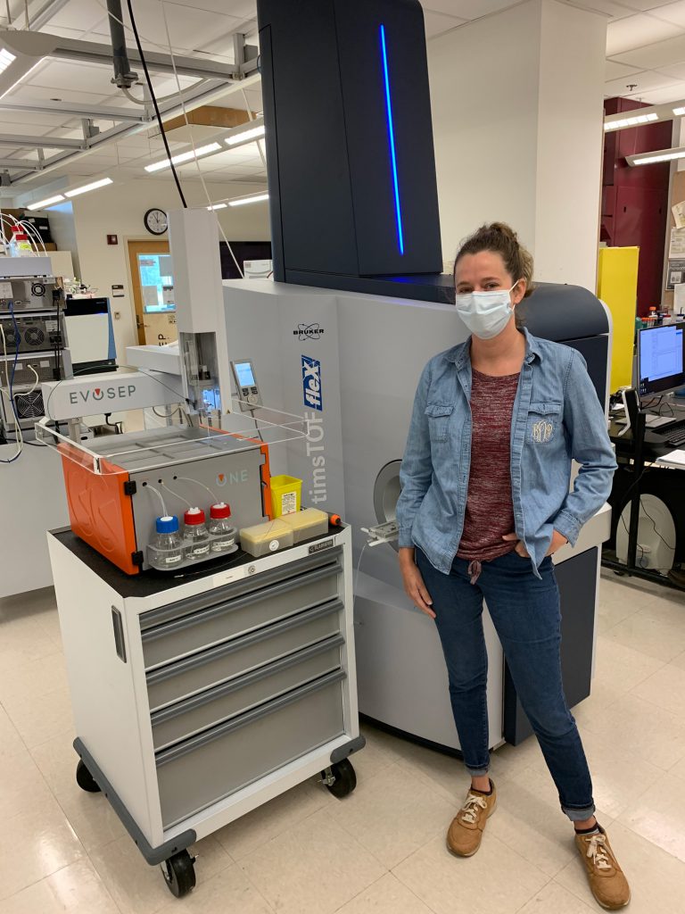 Bryndan Durham stands in front of her new lab equipment, which was delivered right before the shutdown.