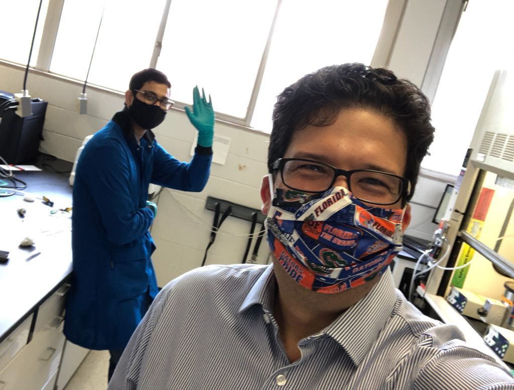 Selfie of Carlos Rinaldi in lab wearing mask.