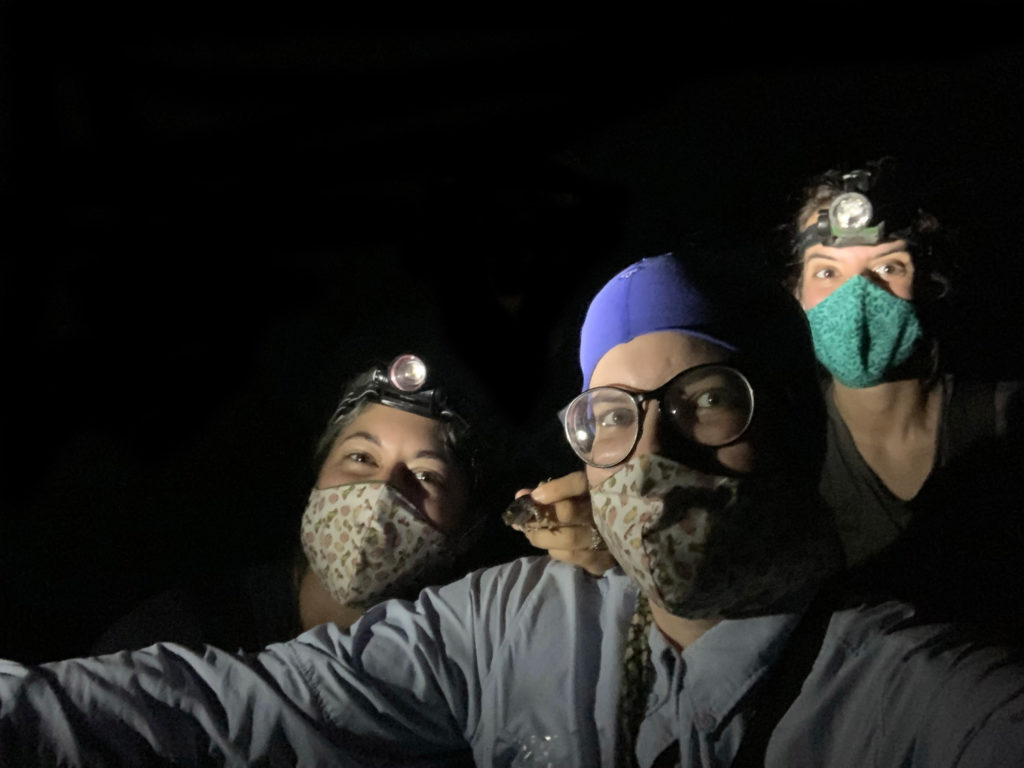 Ana Longo takes a selfie with fellow researchers Sarah McGrath-Blaser and Maria Torres Sanchez while wearing custom masks during field research...