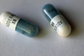 An image of two Adderall pills