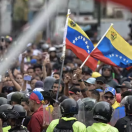 An image of demonstrators protest against Nicolás Maduro’s government in Caracas