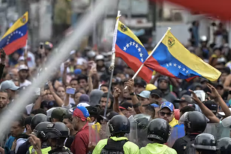 An image of demonstrators protest against Nicolás Maduro’s government in Caracas