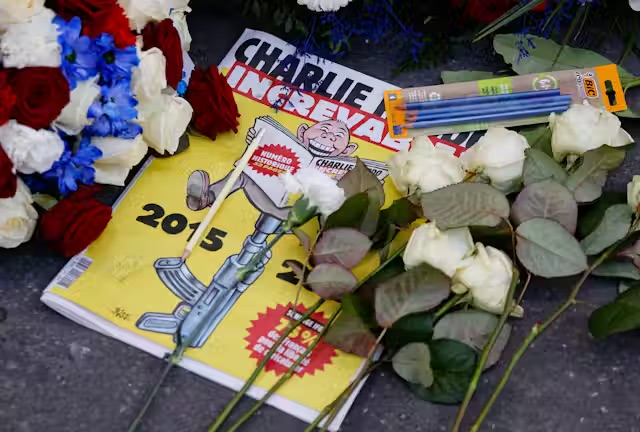 A photo of a special edition of French satirical newspaper Charlie Hebdo commemorates 10 years since an Islamist attack in 2015.