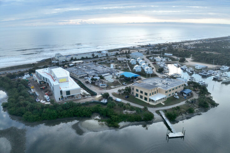 An aerial view photo of the Whitney Laboratory old (right) and new (left) buildings in St. Augustine, Florida.